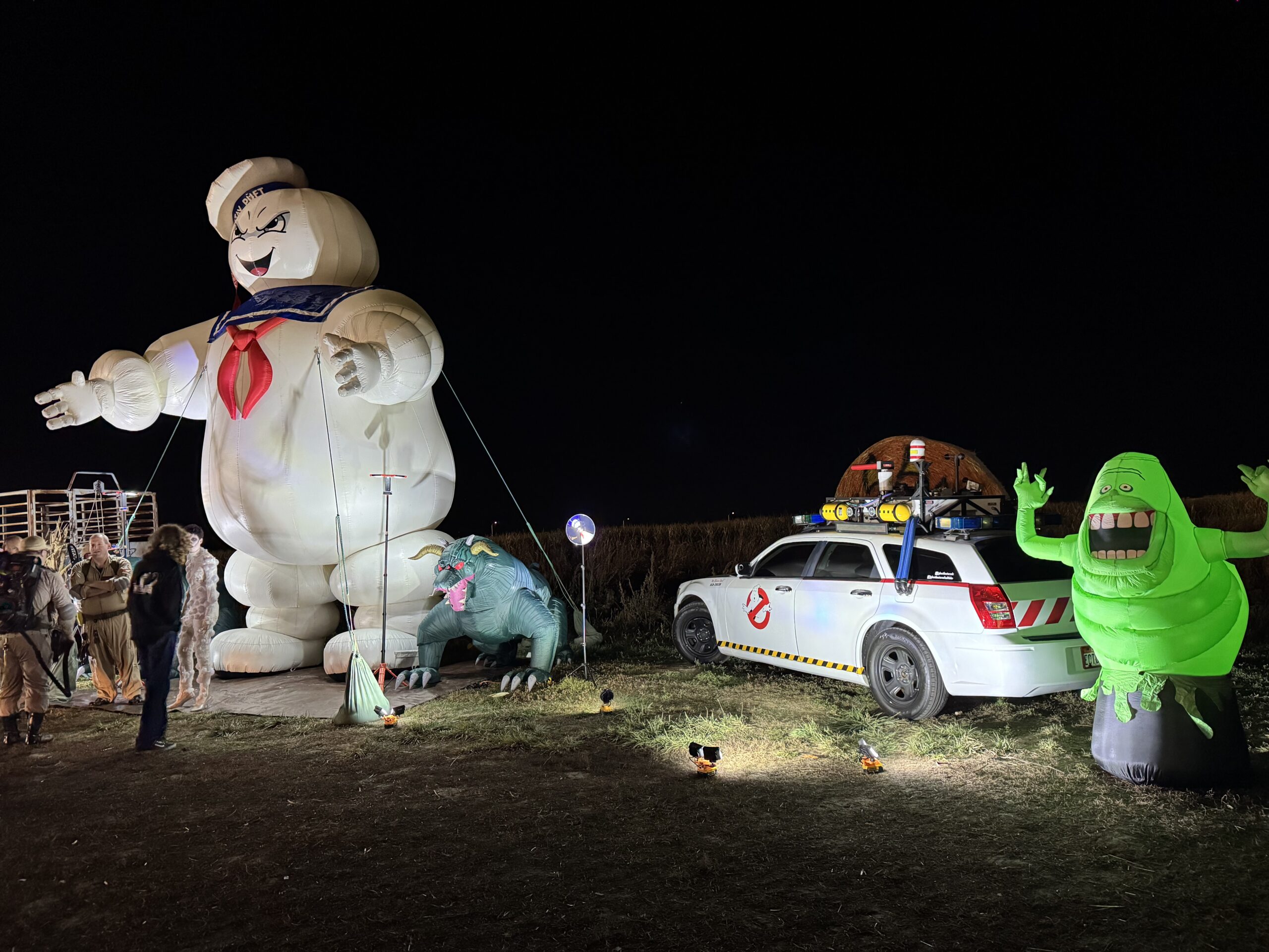 Ghostbusters-themed display with the Stay Puft Marshmallow Man, Ecto-1, and Slimer at Glen Ray’s Corn Maze