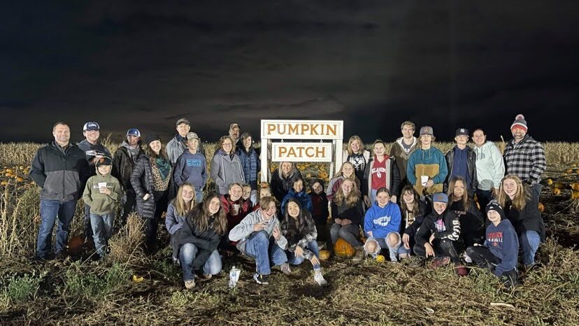 A large group visiting Glen Ray’s Corn Maze together