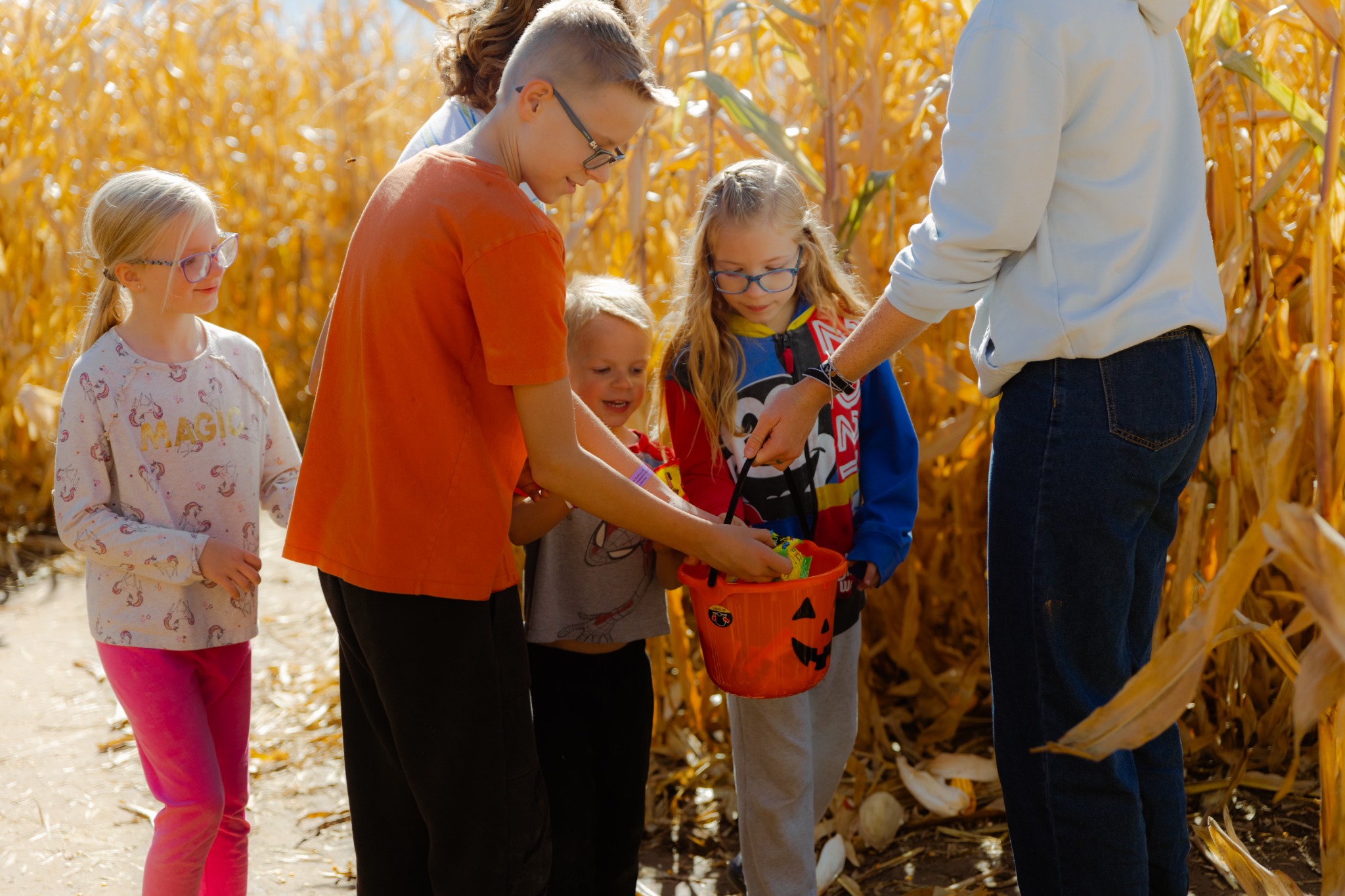 Children trick-or-treating in the corn maze during Glen Ray’s Halloween Bash